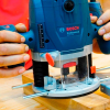 Mașină de frezat verticală Bosch GOF 130 (06016B7000) Mașină de frezat verticală Bosch GOF 130 (06016B7000)