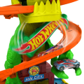 Игровой набор Hot Wheels City: Атака огненного Ти-Рекса Игровой набор Hot Wheels City: Атака огненного Ти-Рекса