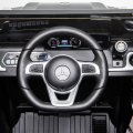 Mașinuță Mercedes-Benz G 500, Baterie 12V7AH, 2 motoare de 35W, roti EVA, scaune din piele Mașinuță Mercedes-Benz G 500, Baterie 12V7AH, 2 motoare de 35W, roti EVA, scaune din piele
