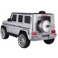 Mașinuță Mercedes-AMG G63, Baterie 12V7AH, 2 motoare de 35W, roti EVA, scaune din piele Mașinuță Mercedes-AMG G63, Baterie 12V7AH, 2 motoare de 35W, roti EVA, scaune din piele