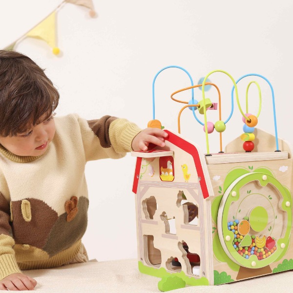Cub educativ din lemn „Ferma”, 7 în 1 Cub educativ din lemn „Ferma”, 7 în 1