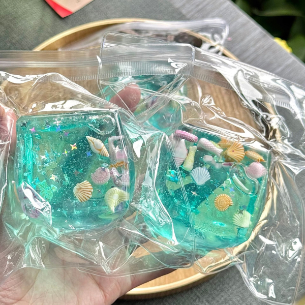Squishy «Кубик льда с ракушками» Flippy, 5×5×5 см, бирюзовый Squishy «Кубик льда с ракушками» Flippy, 5×5×5 см, бирюзовый